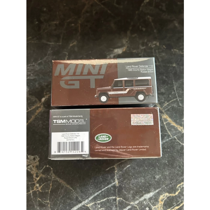 MINI GT: 1/64 Land Rover Defender 110 1985 County Station Wagon Russet Brown