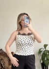 PUANTİYELİ SIRT BAĞLAMA DETAYLI BLUZ