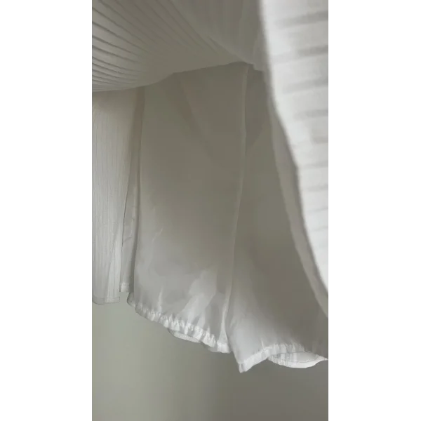 Quzu Pileli Beyaz Etek (içi şort astarlı)