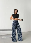 Mavi Yıkamalı Desenli Wide Leg Jean Pantolon