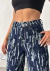 Mavi Yıkamalı Desenli Wide Leg Jean Pantolon
