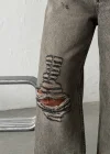 Grunge Stil Eskitme Efektli Geniş Paça Jean