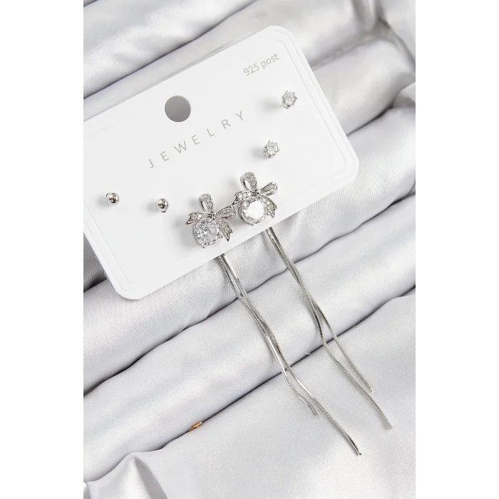 Pirinç Zirkon Taşlı Sallantılı Fiyonk Model Gümüş Renk 925 Ayar Gümüş Çivi Kadın Küpe Set