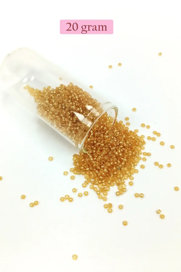 Dökme Cam Kum Boncuk (11/0) 2 mm - 20 Gram -  Şeffaf Altın - BNC027