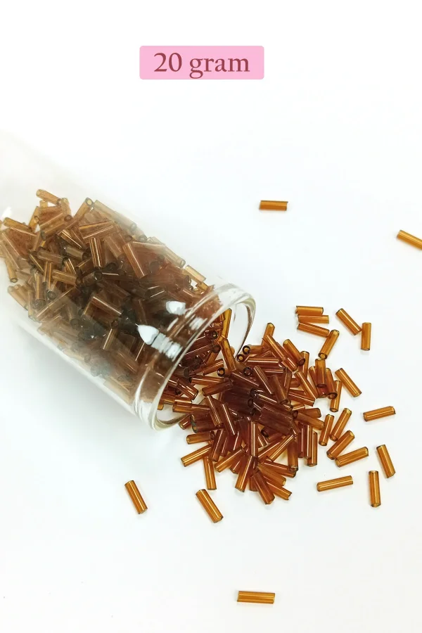 Uzun Boru Kesme Boncuk Çap 2mm Uzunluk 10 mm - 20 Gram - Şeffaf Kahverengi - BNC246