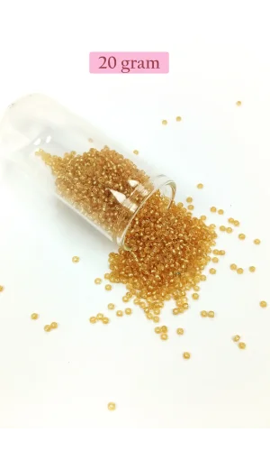 Dökme Cam Kum Boncuk (11/0) 2 mm - 20 Gram -  Şeffaf Altın - BNC027