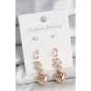Pirinç Gold Renk Zirkon Taşlı Sallantılı Kalp Model Yarım Halka Detay 3 Çift Kadın Küpe Seti