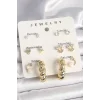 Pirinç Gold Renk Zirkon Taşlı Sarmal Halka Model 7Li Kadın Küpe Seti