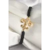 Pirinç Gold Renk Zirkon Taşlı Zambak Figür Asansörlü Makrome Model Kadın Bileklik