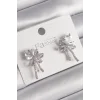 Pirinç Gümüş Renk Zirkon Taşlı Kurdele Model Kadın Küpe