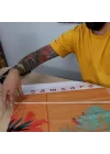 Renkli Bitkiler Arasında Meditasyon Havası Sunan Duvar Flaması | Kumaş Duvar Posteri | 25x50 – 50x100 cm