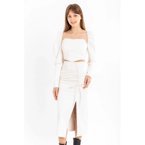 Deri Kumaş Diz Altı Boy Yırtmaçlı Büzgü Detaylı Kadın Etek-Ekru