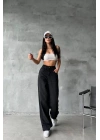 Arkadan tokalı jeans pantolon Siyah