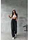 Arkadan tokalı jeans pantolon Siyah