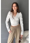 Kruvaze Yaka Beli Kuşaklı Crop Bluz