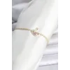 Pirinç Gold Renk Zirkon Taşlı Swan Model Su Yolu Kadın Bileklik