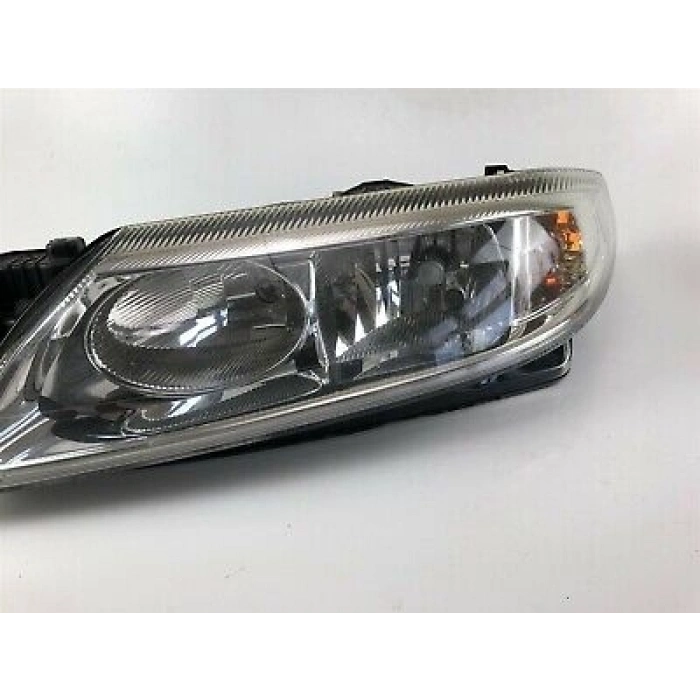 Renault Laguna Ön Far Sol 2001  (Oem No:  7701048927)