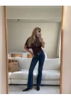 Düşük Bel Bootcut Arka Cep Detaylı Koyu Kot Pantolon