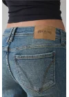 Düşük Bel Mavi Yıkamalı Denim Flare Pantolon