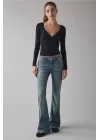 Düşük Bel Mavi Yıkamalı Denim Flare Pantolon