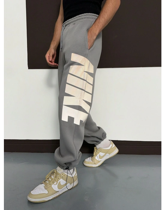 ÖZEL SERİ BÜYÜK NK REFLEKTÖRLÜ PAÇA LASTİKLİ EŞOFMAN ALTI GRİ