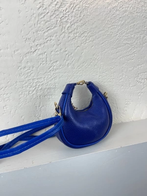 Saks Mavi Yumuşak Deri Mini Çanta CB2217