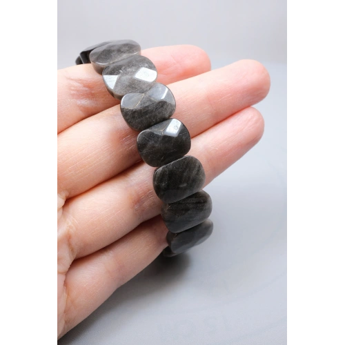 Gece Gökyüzünün Gümüş Şifası: Parlak Oval Faset Kesim Silver Obsidyen Bileklik