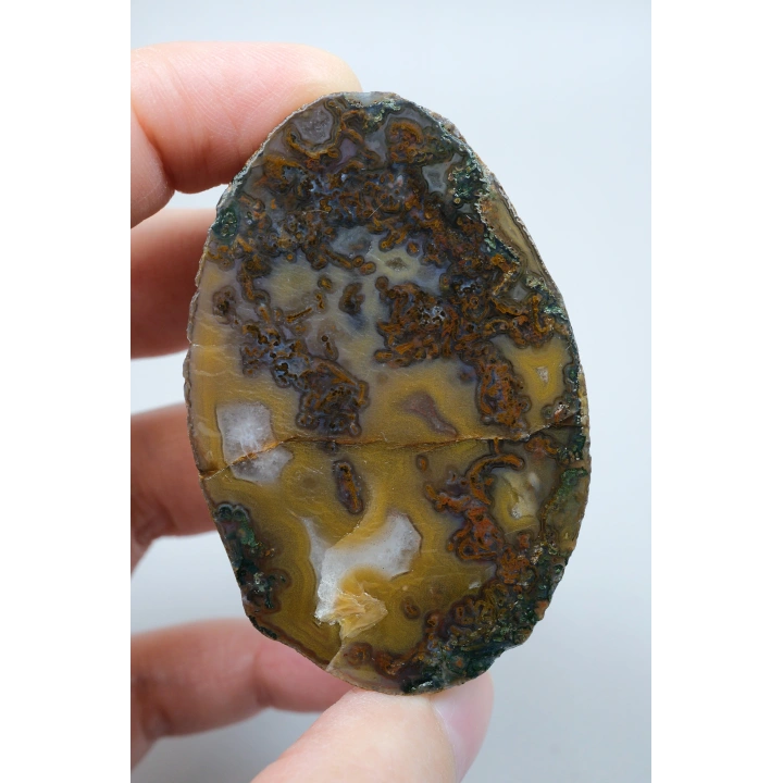 土トーンの青銅色のサビと紺碧の海羽アゲート