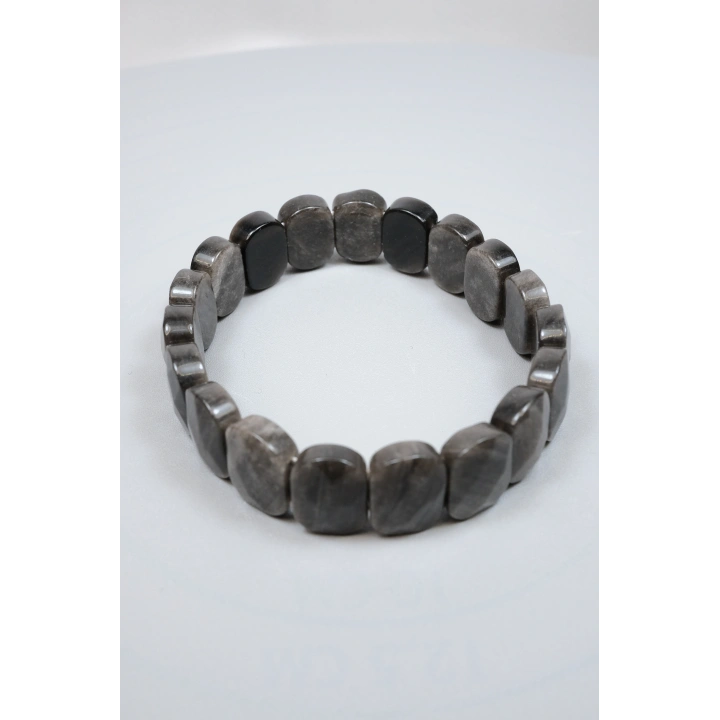 Gece Gökyüzünün Gümüş Şifası: Parlak Oval Faset Kesim Silver Obsidyen Bileklik