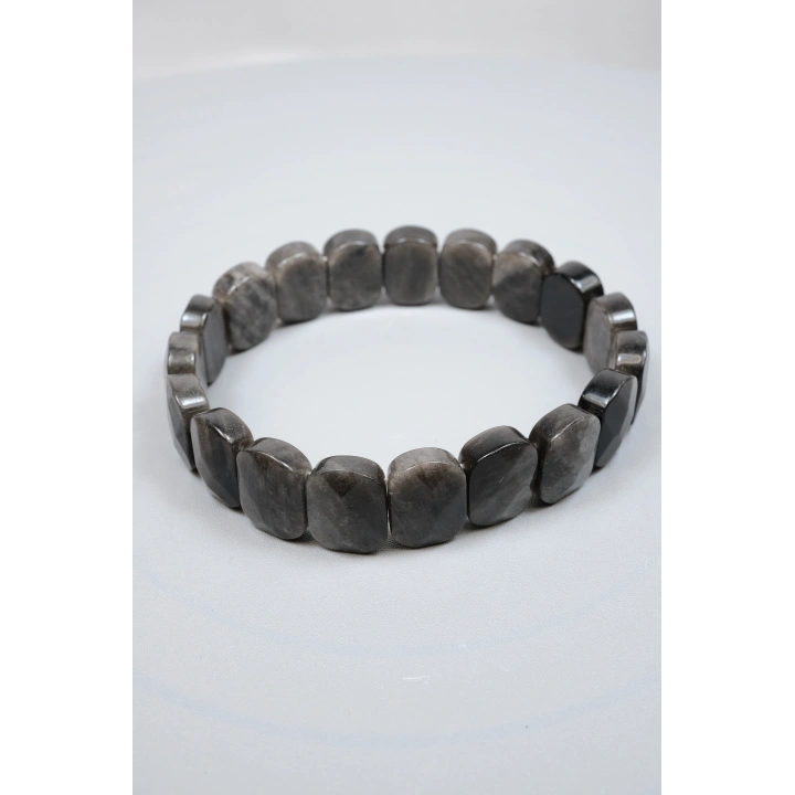 Gece Gökyüzünün Gümüş Şifası: Parlak Oval Faset Kesim Silver Obsidyen Bileklik