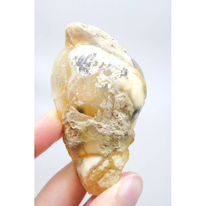 小黄色树枝状蛋白石晶洞，具有自然“眼睛”形态和黑色晶核，41克