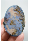 Ágata del Mar Negro con bordes azules, crema y bordados de óxido