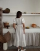 Kadın  Ekru V Yaka Beli Lastikli Büzgülü Bej Müslin Kumaş Kısa Kol Elbise
