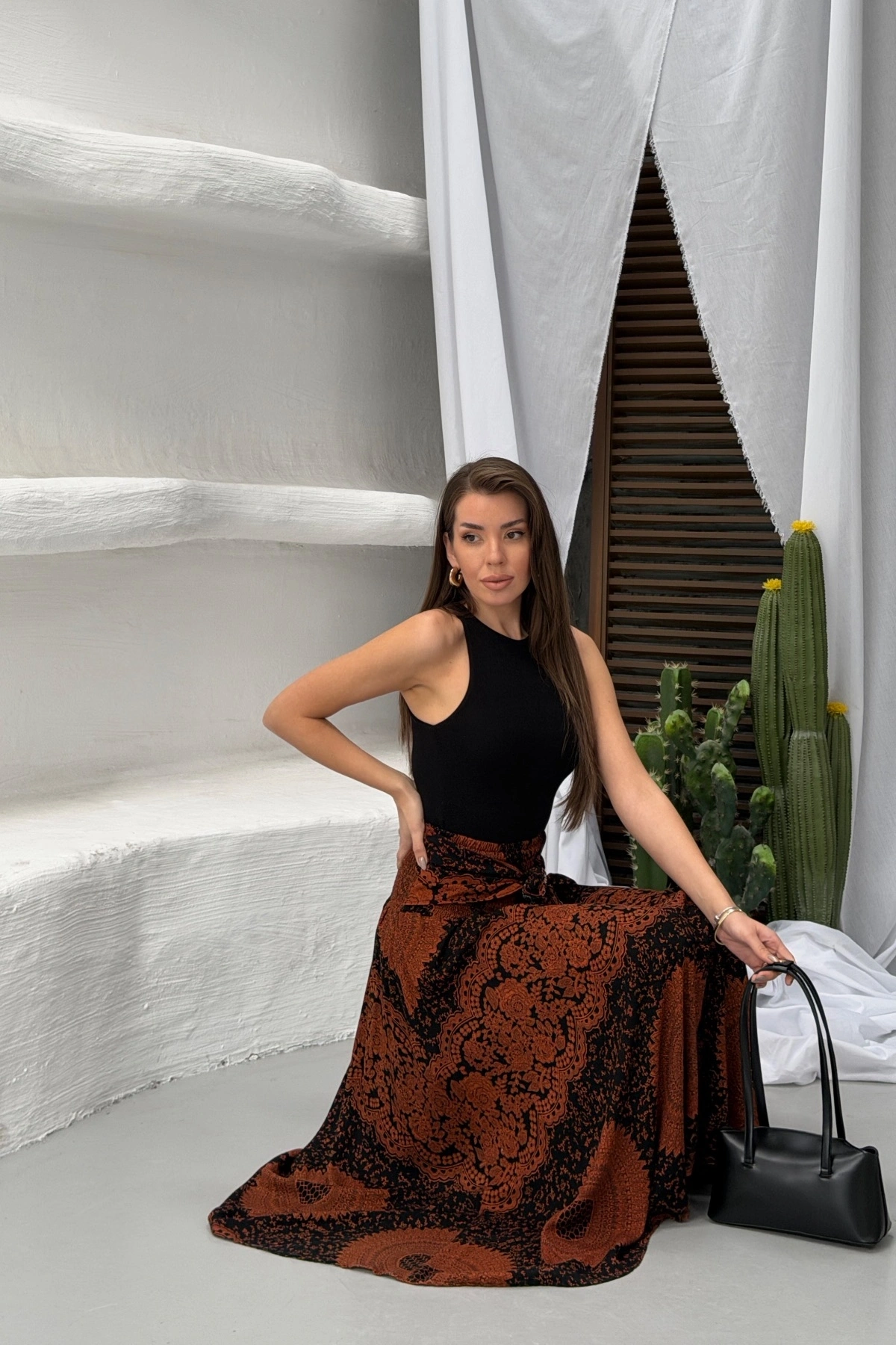 Kadın Kahverengi Yüksek Bel Bağlama Detaylı Şık Etnik Desenli Asimetrik Kesim Midi Etek