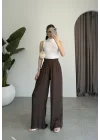 Beli Lastikli Kahve Tiril Pantolon