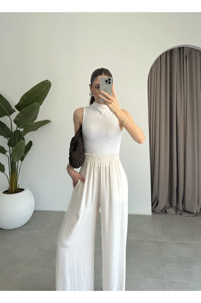 Beli Lastikli Ekru Tiril Pantolon