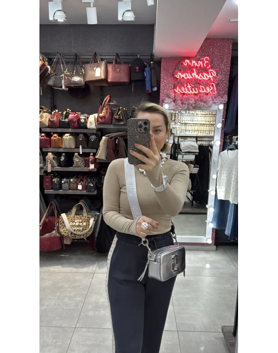 Parmaktan geçmeli bluz