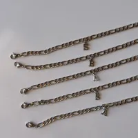 ÇELİK UNISEX HARFLİ BİLEKLİK ( tek adettir)