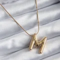 BUĞZ 316L Çelik Gold Renk Bubble M Harf Model Kadın Kolye