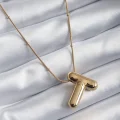 BUĞZ 316L Çelik Gold Renk Bubble T Harf Model Kadın Kolye