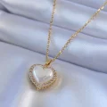 BUĞZ 316L Çelik Gold Renk İncili Kalp Model Zirkon Taşlı Kadın Kolye