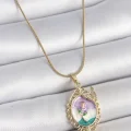 BUĞZ 316L Çelik Gold Renk Zincir Mix Renk Mineli Çiçek İşlemeli Zirkon Taş Detaylı Portre Model Kadın Kolye