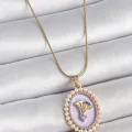 BUĞZ 316L Çelik Gold Renk Zincir Mor Mineli İncili Zirkon Taşlı Çiçek İşlemeli Portre Model Kadın Kolye