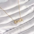 BUĞZ 316L Çelik Gold Renk Zincir Zirkon Taşlı Sonsuzluk Model Kadın Kolye