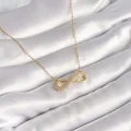 BUĞZ 316L Çelik Gold Renk Zincir Zirkon Taşlı Sonsuzluk Model Kadın Kolye - BUĞZ
