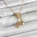 BUĞZ 316L Çelik Gold Zirkon Taşlı Deniz Tema Charmlı Kadın Kolye