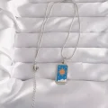 BUĞZ 316L Çelik Gümüş Renk Mavi Mineli Güneş Model Tarot Kolye - Lisinya