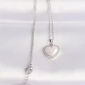 BUĞZ 316L Çelik Zincir Gümüş Renk Beyaz Taşlı Bombeli Kalp Kolye
