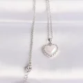 BUĞZ 316L Çelik Zincir Gümüş Renk Beyaz Taşlı Bombeli Kalp Kolye - Lisinya