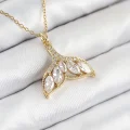 BUĞZ 316L Çelik Zirkon Taşlı Balık Kuyruğu Model Gold Renk Kadın Kolye